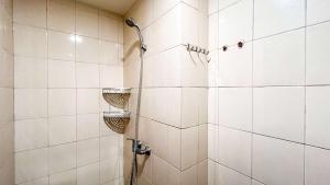 Best Choice Studio Apartment at Vida View Makassar By Travelio