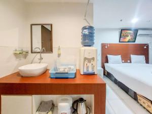 Good and Restful Studio (No Kitchen) at Sentraland Medan Apartment By Travelio