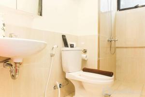 Comfortable 2BR with Study Room at Meikarta Apartment By Travelio