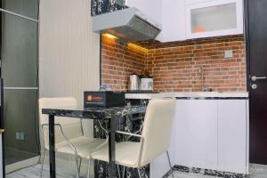 Best Location 1BR Apartment at Atlanta Residences By Travelio