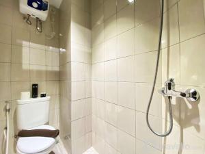 Comfort Studio Room at Mekarwangi Square Cibaduyut Apartment By Travelio