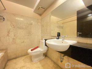 Simply and Homey 2BR at Braga City Walk Apartment By Travelio