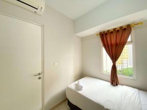 Elegant and Comfy 2BR Springlake Summarecon Bekasi Apartment near Summarecon Mall By Travelio