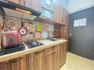 Scandinavian Studio Room at Grand Asia Afrika Apartment By Travelio