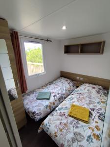 Campings MOBIL HOME 40M2 ECRIN DE VERDURE : photos des chambres
