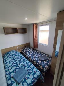 Campings MOBIL HOME 40M2 ECRIN DE VERDURE : photos des chambres
