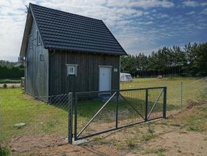 Drewniany domek na kaszubach u Oli