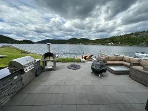 Large apartment with pier house and private beach - Gjerstad