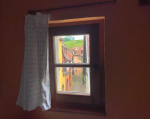 Appartements La Maison Bleue - Historic House in the Heart of Riquewihr : photos des chambres