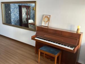 Habitación privada con baño privado en Miraflores a un paso del malecón con áreas comunes compartidas