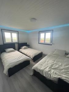 Appartements Gite rez de chaussee maison : photos des chambres