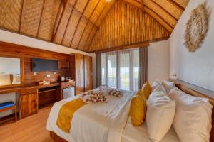 Phòng Deluxe Giường cỡ queen Nhìn ra Biển (Deluxe Queen Room with Sea View)