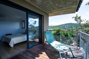 Villas Villa de luxe surplombant la mer, piscine suspendue : photos des chambres