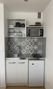 Appartements Studio - balcon - bord de mer : photos des chambres