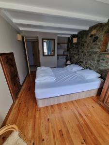 CHALETS JEANNE & ARNOL a Allemond - Grand Domaine Alpe d'Huez : photos des chambres