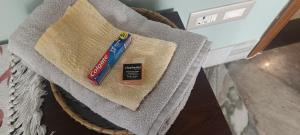 Riverside Palm Luxe 2BHK with AC in both bedrooms near Kamakhya & IHR