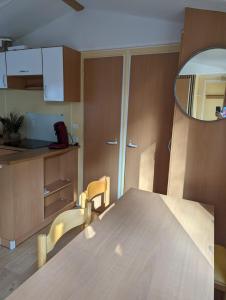 Campings Mobilhome tout confort dans domaine boise : photos des chambres