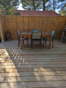 Campings Mobilhome tout confort dans domaine boise : photos des chambres