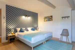 Maisons de vacances Chez Sylvie - Etonnante maison climatisee dans les remparts : photos des chambres
