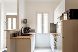 Maisons de vacances Chez Sylvie - Etonnante maison climatisee dans les remparts : photos des chambres