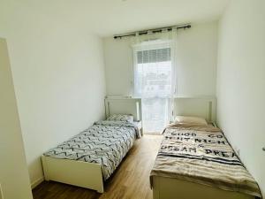 Appartements Appartement spacieux et calme 20 min Champs Elysee : photos des chambres