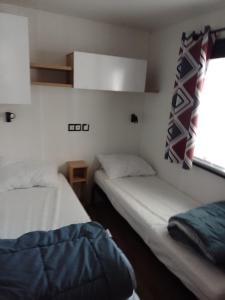 Campings MHVACANCES LOUENT PLUSIEURS MOBILHOMES DANS CAMPING 4 ETOILES PROCHE CHATEAUX et ZOO BEAUVAL : photos des chambres