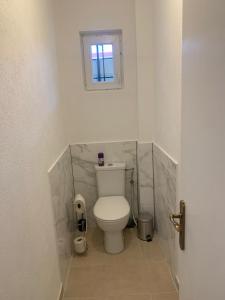 Appartements Appartement en face de la gare de St-Louis : photos des chambres