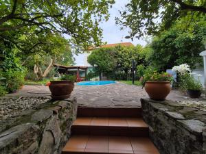 Apartment 55 m2, sunny garden & pool in Villa 1905