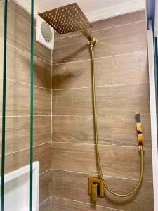 Studio dourado no coração da Av Paulista