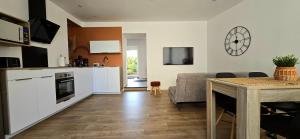 Appartements Le P'tit Patio, Terrasse privative. : photos des chambres