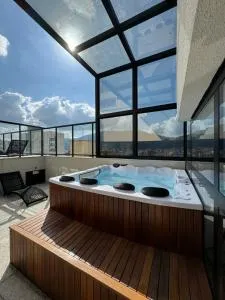 Studio aconchegante - Andradas