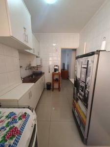 Apartamento na Enseada - A 5 minutos a pé da praia com Wi-Fi e TV a Cabo