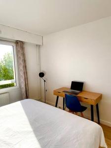 Appartements Grand appartement lumineux a proximite de Paris : photos des chambres