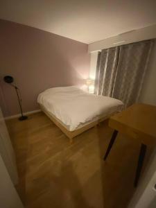 Appartements Grand appartement lumineux a proximite de Paris : photos des chambres