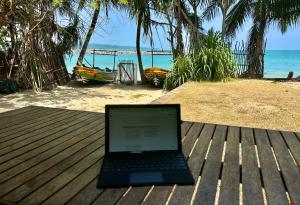 Namaskara by the Beach - Charming Beachfront Bungalow Retreat