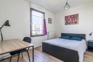 Appartements Cosy pres du stade de France avec Parking ! : photos des chambres