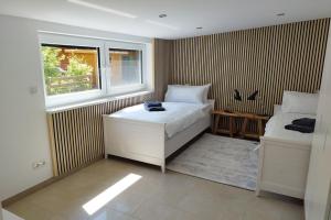 Apprimus Ferienwohnungen - Waldsee Rieden Panoramaterrasse 6 OG