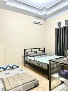 HARMONI GUEST HOUSE tumpak sewu