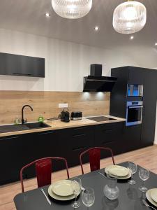 Appartements Appartement hyper centre lit King Seize : photos des chambres