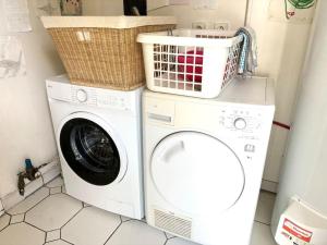 Maisons de vacances Belle maison familiale - Proche Golf National : photos des chambres