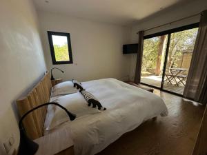 Villas Villa de luxe surplombant la mer, piscine suspendue : photos des chambres