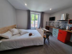 Appartements La Maison Lourego Tournesol : photos des chambres