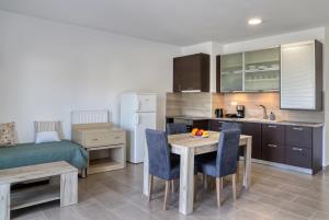 Two-Bedroom Apartment with Bay View room in Helios Studios & Apartments