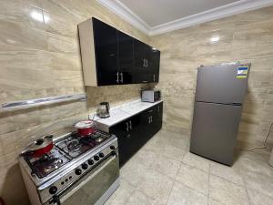 شقة غرفتين وصالة في داون تاون العلمين مع اكسس للشاطئ