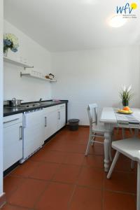 Ferienhaus am Gutspark Drankse Ferienwohnung Sandglöckchen