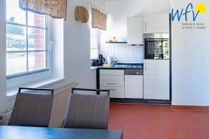 Ferienhaus am Gutspark Drankse Ferienwohnung Strandroggen