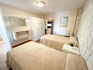 Apartamentos Portonovo Playa 3000