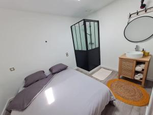 Maisons de vacances Dependance avec place de parking : photos des chambres