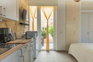 Authentic GF apartment with terrace at the 3 Cities Marina