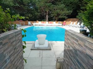 Maisons de vacances Chalet dans camping a Camon : photos des chambres